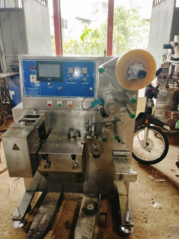 Máy đóng gói kẹo lạc, bánh cháy